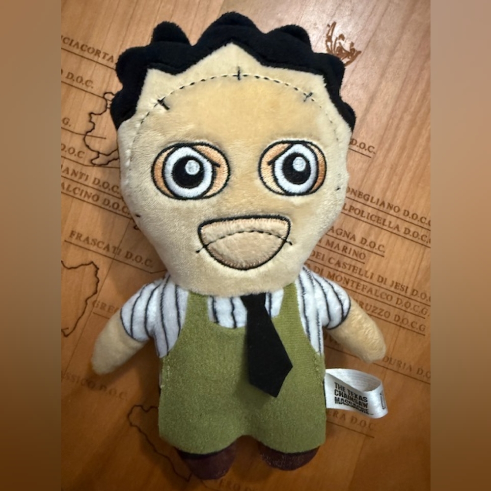 Plush Toy with Green and Black Outfit